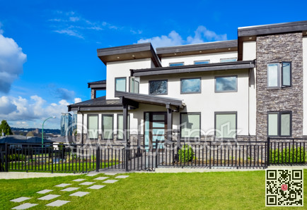 New residential house with concrete tile pathway over the front yard