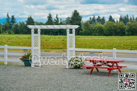 Agriculture farm with rest area on bright summer day