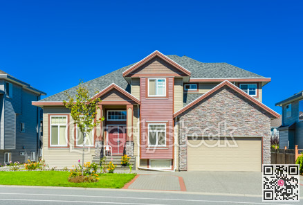 New family house on sunny day on blue sky background