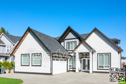 A perfect neighbourhood. Brand new luxury family house on bright winter day