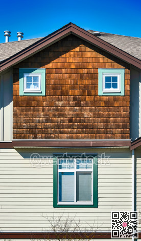 Top of residential townhouse on a bright spring day