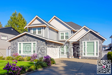 A perfect neighbourhood. Brand new luxury family house on bright winter day