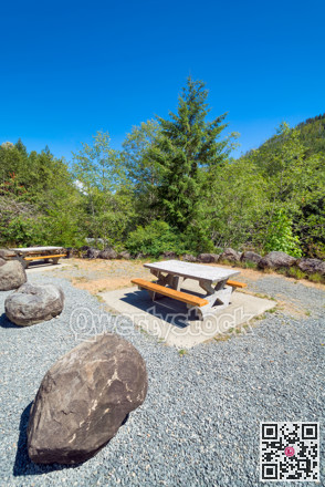 Rest area with concrete table on a hiking route