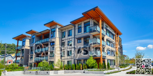 Brand new apartment building on sunny day in British Columbia, Canada