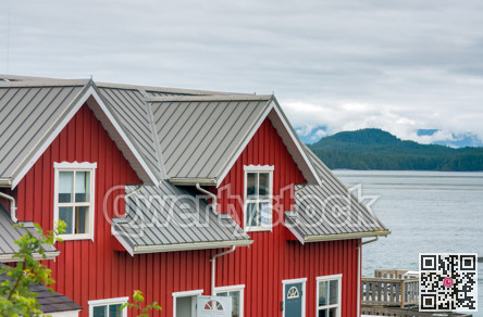 Top of residential building with Pacific ocean overview on coudy day